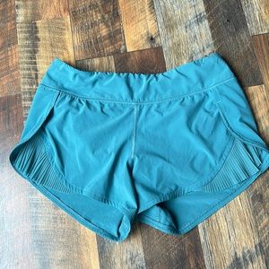 Lululemon shorty short 2 1/2 inseam, cute frill at front thigh split. Size 6